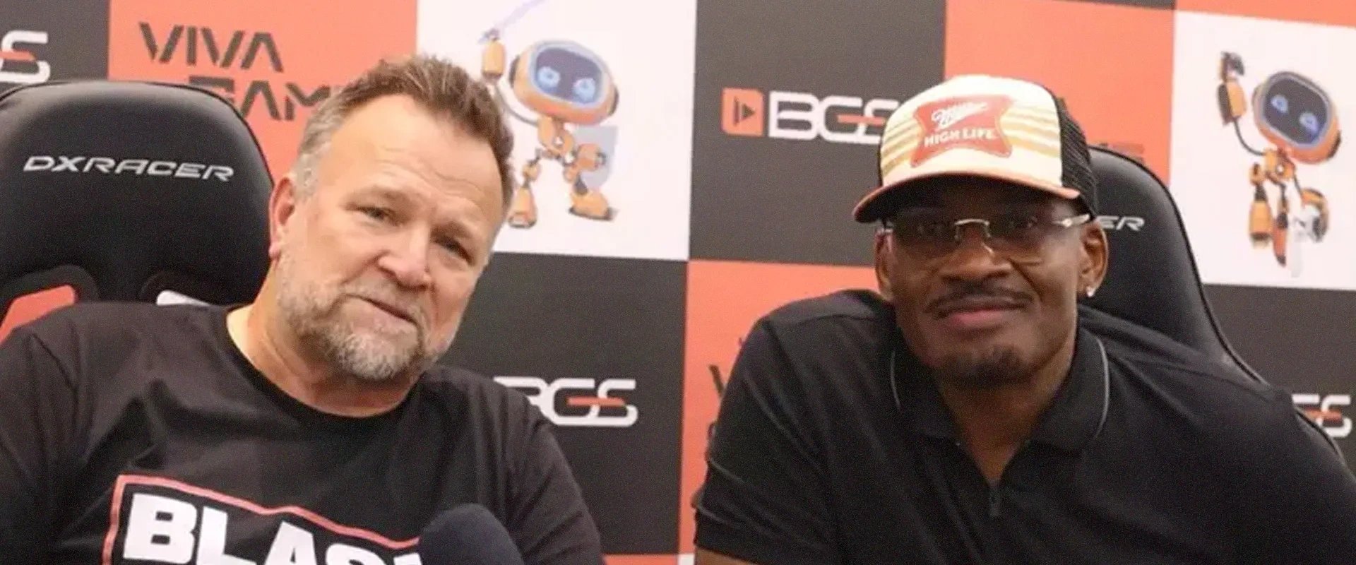 foto de Ned Luke à esquerda e Shawn Fonteno à direita no evento BGS 2024